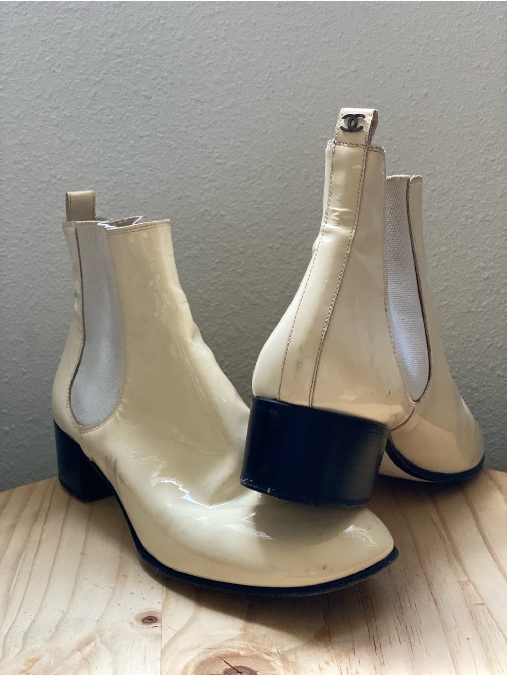 CHANEL Cream Patent Leather Chelsea Booties with Black Block Heel
